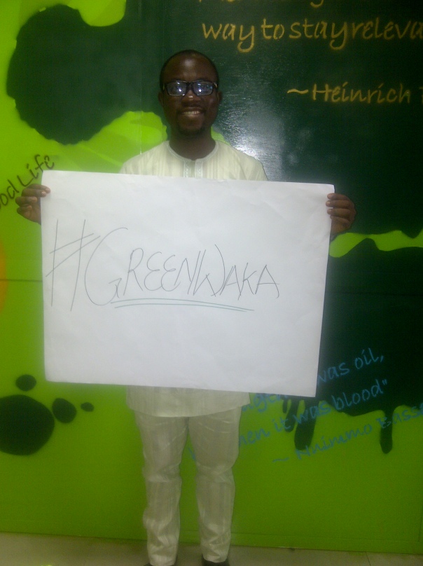 Dotun Roy posing for #GreenWaka